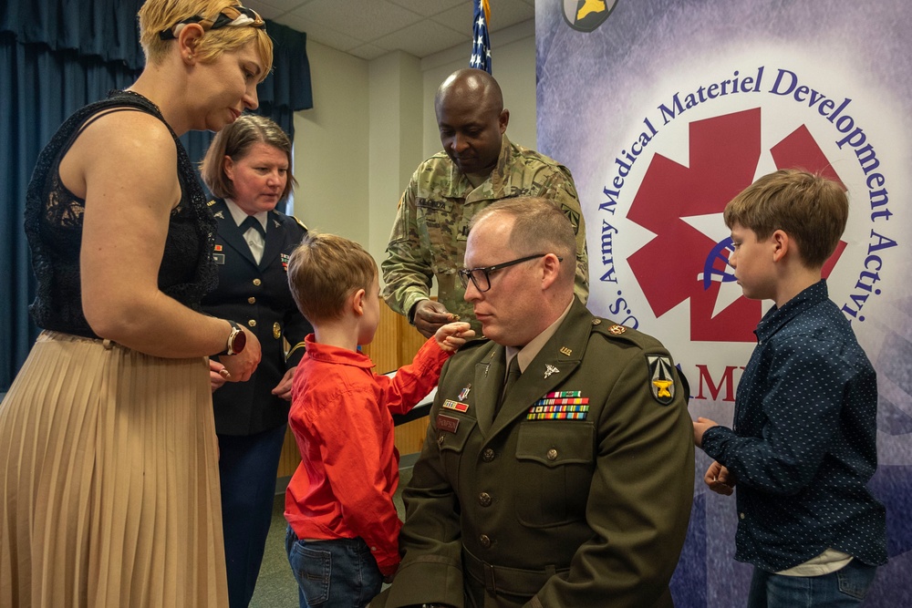 Family, friends, colleagues gather for USAMMDA Army product developer's field grade promotion