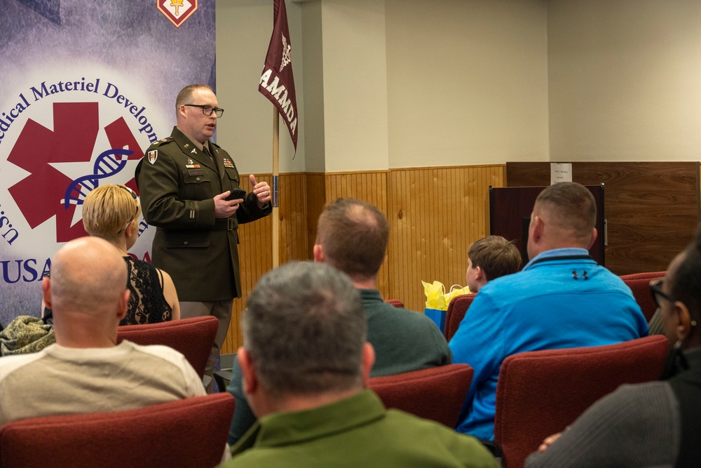 Family, friends, colleagues gather for USAMMDA Army product developer's field grade promotion