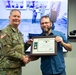 Frank Veraldi receives the Civilian Service Commendation Medal during farewell ceremony