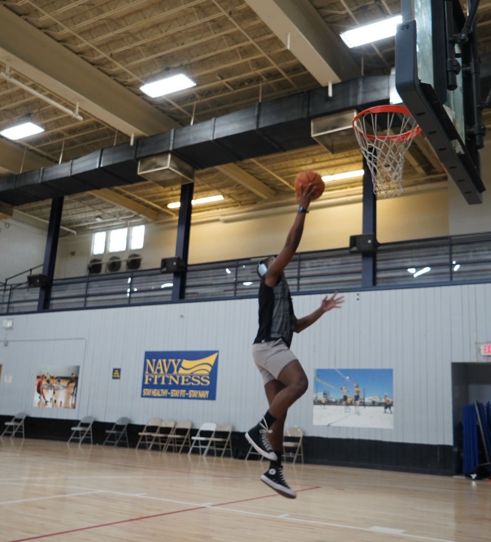 Newly refinished basketball gym floor at Huntington Hall Naval Berthing Facility