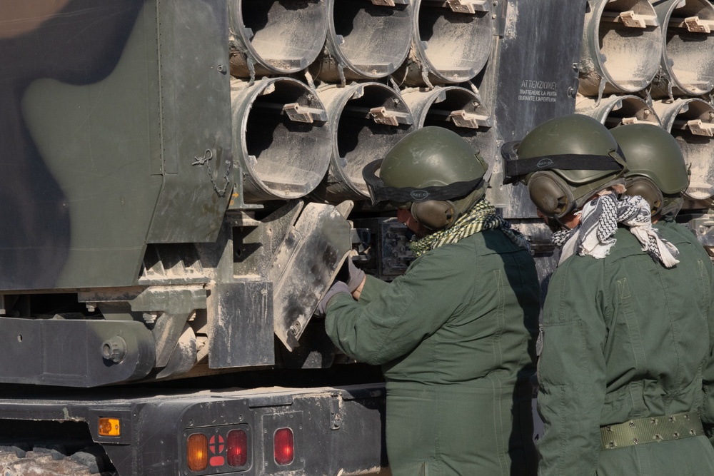 Italian soldiers prepare for a dry fire rehearsal during Exercise Ferocious Falcon 5