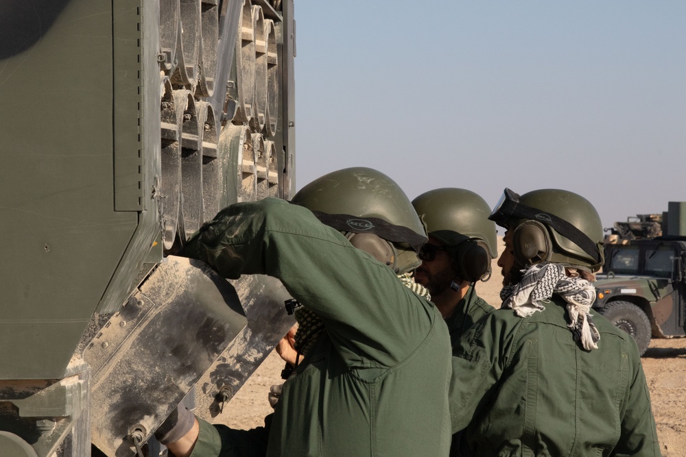 Italian soldiers prepare for a dry fire rehearsal during Exercise Ferocious Falcon 5