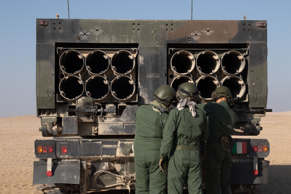 Italian soldiers prepare for a dry fire rehearsal during Exercise Ferocious Falcon 5