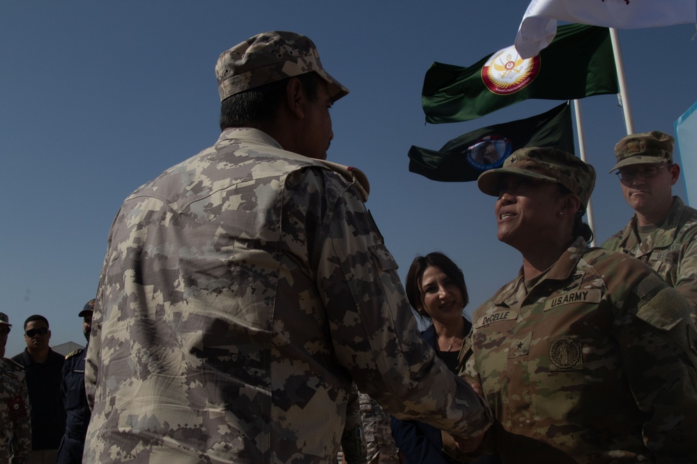 U.S. Army Brig. Gen. Marlena DeCelle, Deputy Commanding General-Support of Task Force Spartan, greets a Qatari Emiri Air Force pilot during Exercise Ferocious Falcon 5,