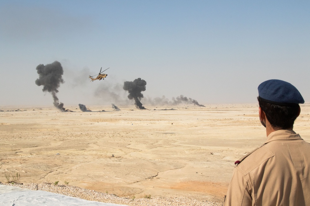 Qatari Armed Forces fire rounds from their Apache AH-64 helicopters during Exercise Ferocious Falcon 5