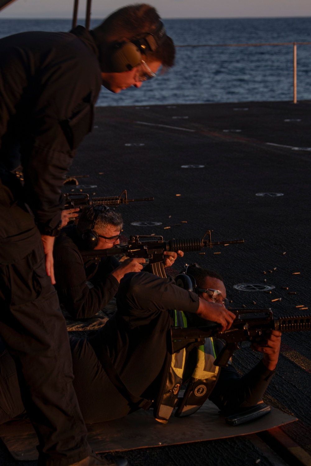 Abraham Lincoln conducts small-arms live fire exercise