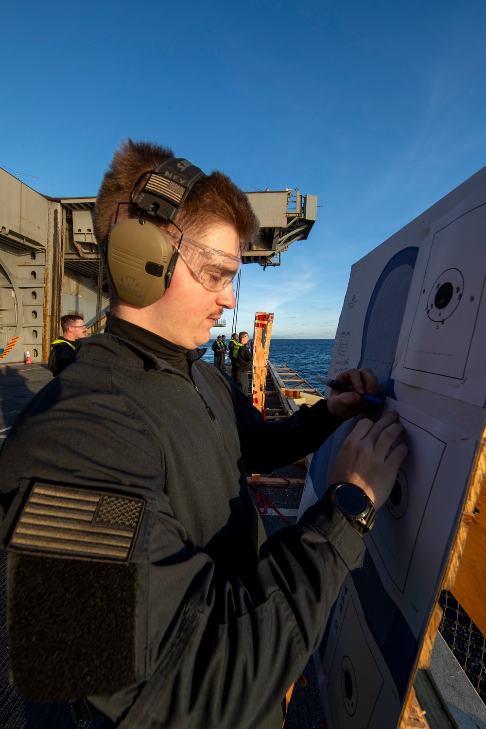 Abraham Lincoln conducts small-arms live fire exercise