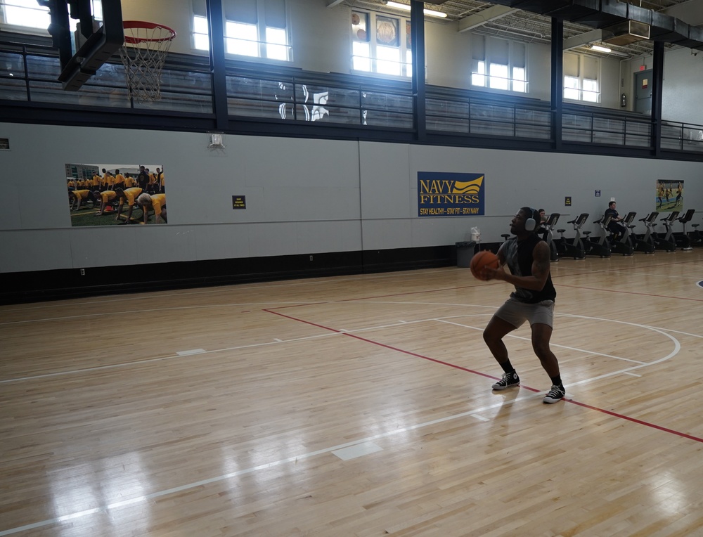 Newly refinished gym floor at Huntington Hall Naval Berthing Facility