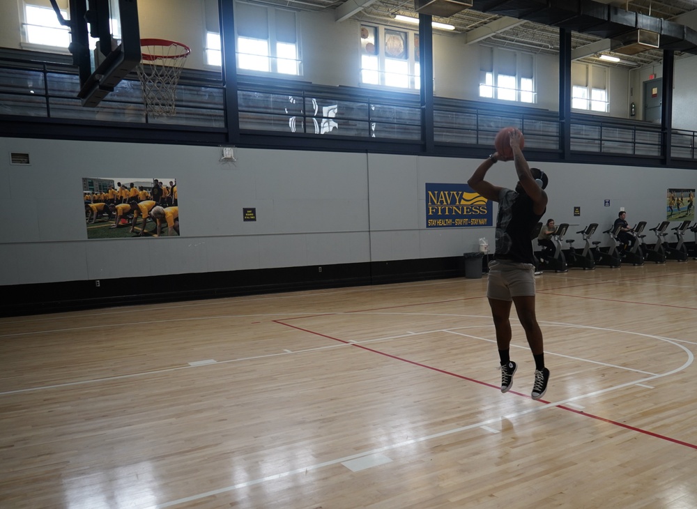 Newly refinished basketball gym floor at Huntington Hall Naval Berthing Facility