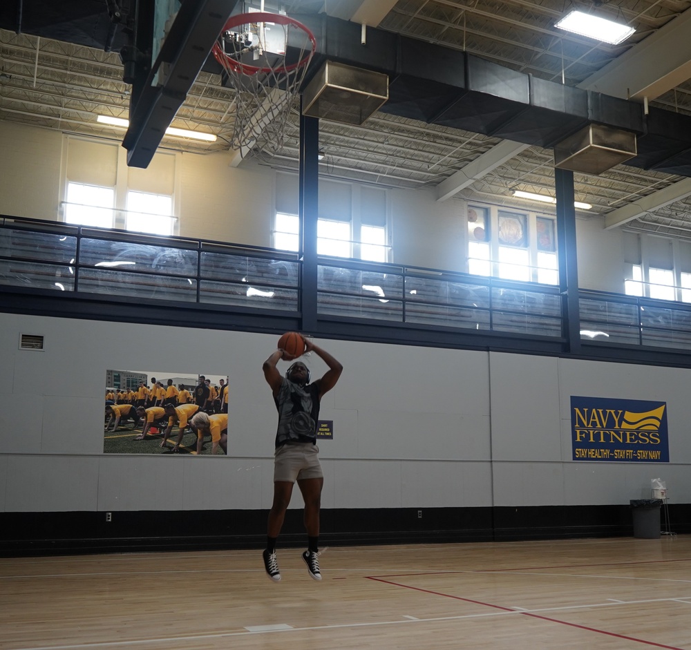 Newly refinished basketball gym floor at Huntington Hall Naval Berthing Facility