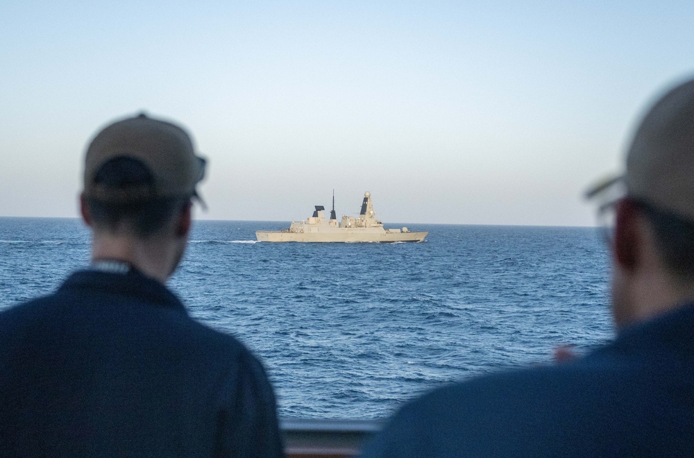 USS Mason Sails Alongside HMS Diamond During a Passenger Transfer in the Red Sea