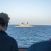 USS Mason Sails Alongside HMS Diamond During a Passenger Transfer in the Red Sea