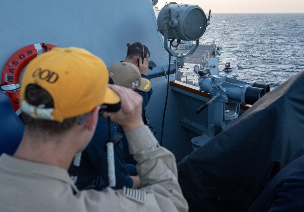 USS Mason Sails Alongside HMS Diamond During a Passenger Transfer in the Red Sea