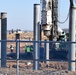 Army engineers construct a hangar on Camp Humphreys, South Korea