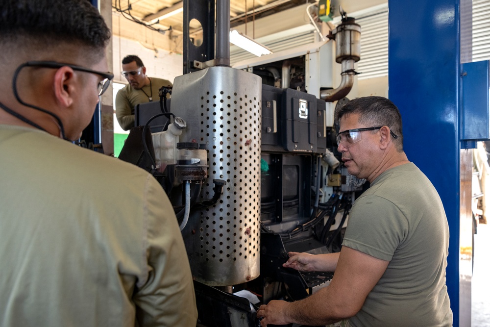 Vehicle Maintenance Airmen repair 13K AT forklift