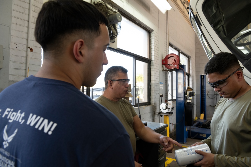 Vehicle Maintenance Airmen repair 13K AT forklift