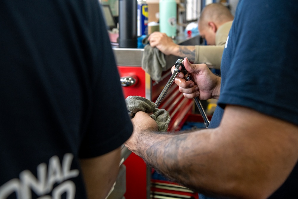 Vehicle Maintenance Airmen repair 13K AT forklift