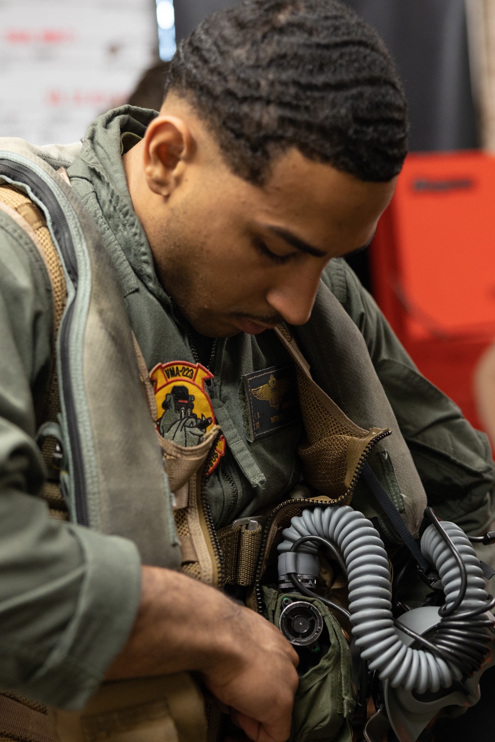 U.S. Marine from Milwaukee flies in an AV-8B Harrier II jet as an incentive for reenlisting