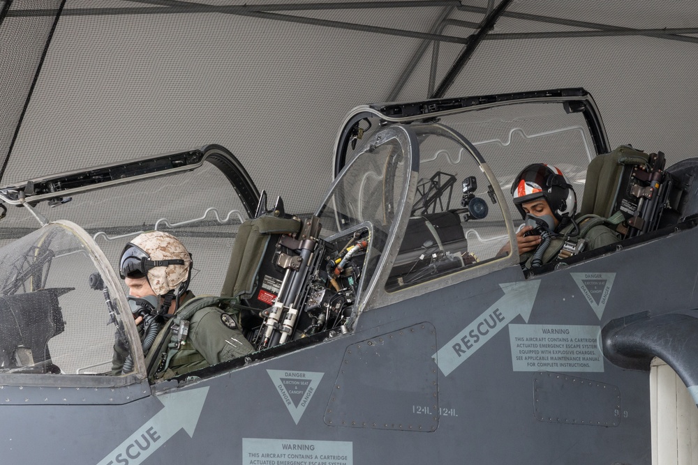 U.S. Marine from Milwaukee flies in an AV-8B Harrier II jet as an incentive for reenlisting