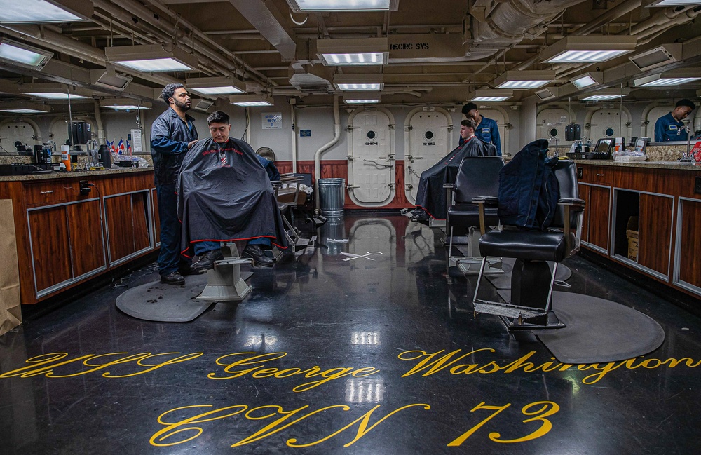 George Washington's barbershop gives haircuts to Sailors