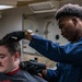 George Washington's barbershop gives haircuts to Sailors