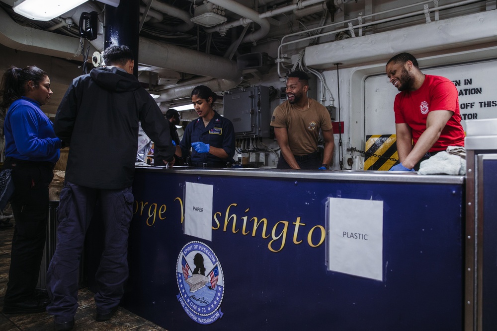 George Washington's First Class Petty Officer Association assists with galley operations