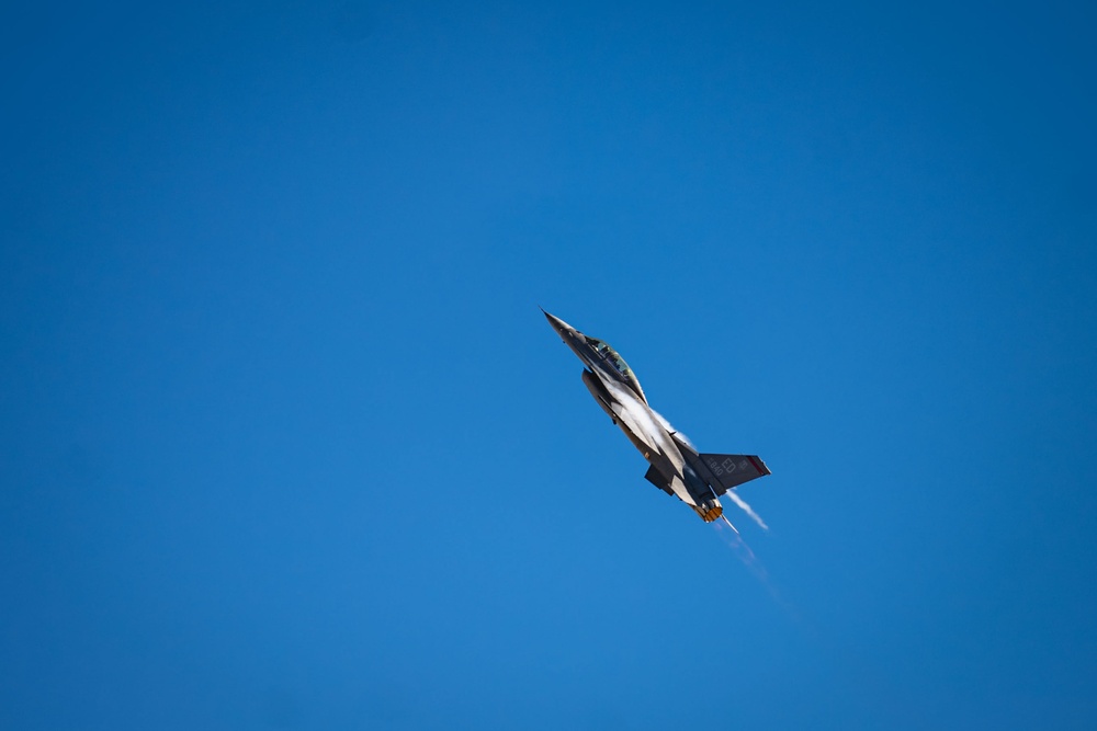 The F-16 Viper Demonstration Team performs at the F-16 First Flight 50th Anniversary Event