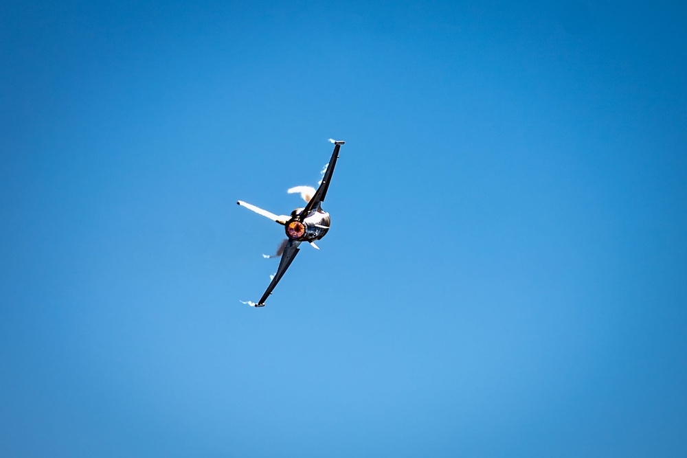 The F-16 Viper Demonstration Team performs at the F-16 First Flight 50th Anniversary Event