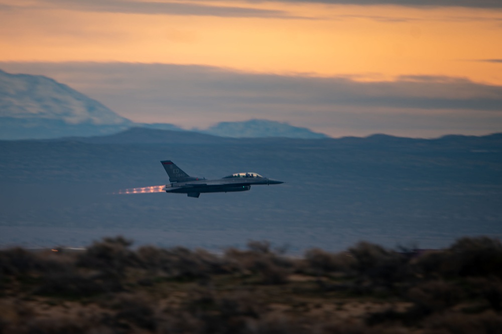 The F-16 Viper Demonstration Team performs at the F-16 First Flight 50th Anniversary Event