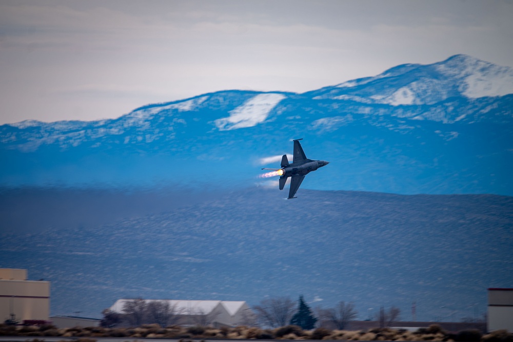 The F-16 Viper Demonstration Team performs at the F-16 First Flight 50th Anniversary Event