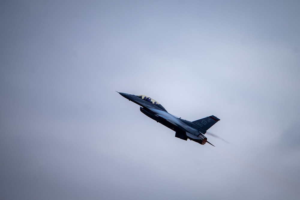 The F-16 Viper Demonstration Team performs at the F-16 First Flight 50th Anniversary Event