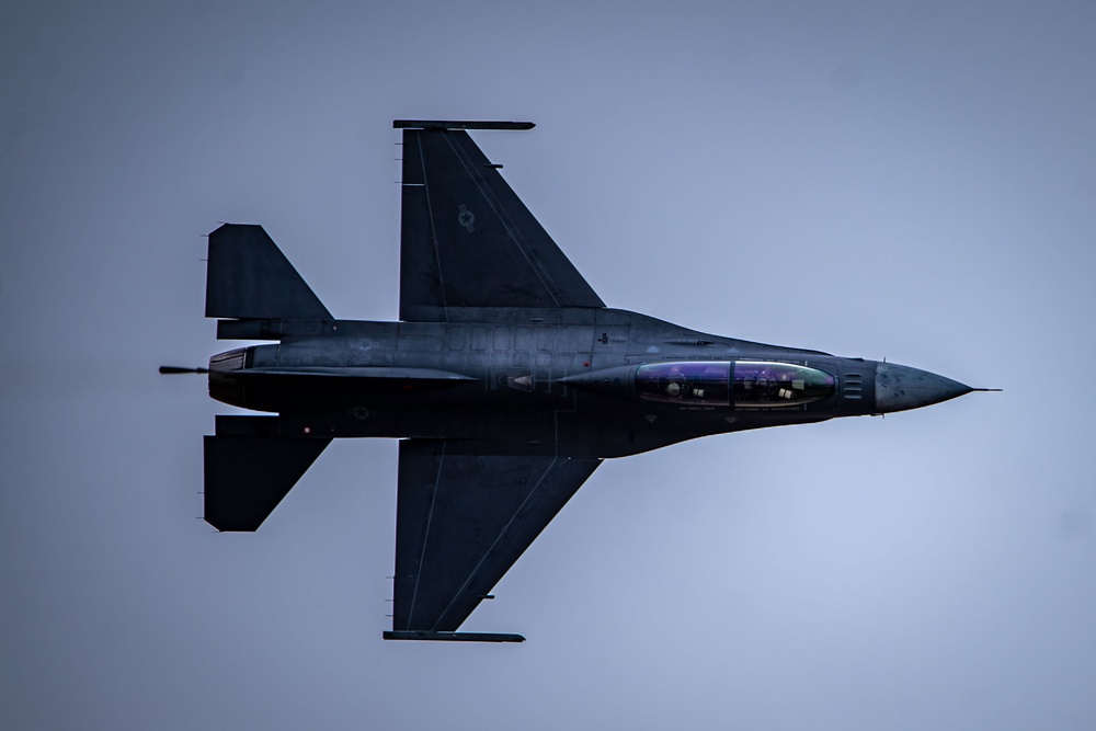 The F-16 Viper Demonstration Team performs at the F-16 First Flight 50th Anniversary Event