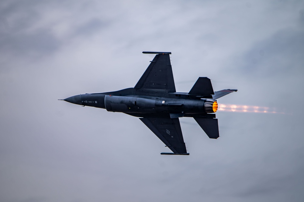 The F-16 Viper Demonstration Team performs at the F-16 First Flight 50th Anniversary Event