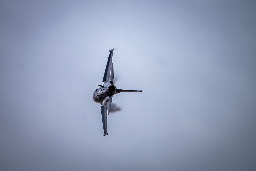 The F-16 Viper Demonstration Team performs at the F-16 First Flight 50th Anniversary Event