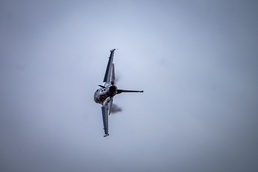 The F-16 Viper Demonstration Team performs at the F-16 First Flight 50th Anniversary Event
