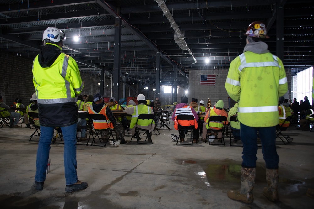 Team Andrews commemorates Consolidated Communications Center topping out ceremony