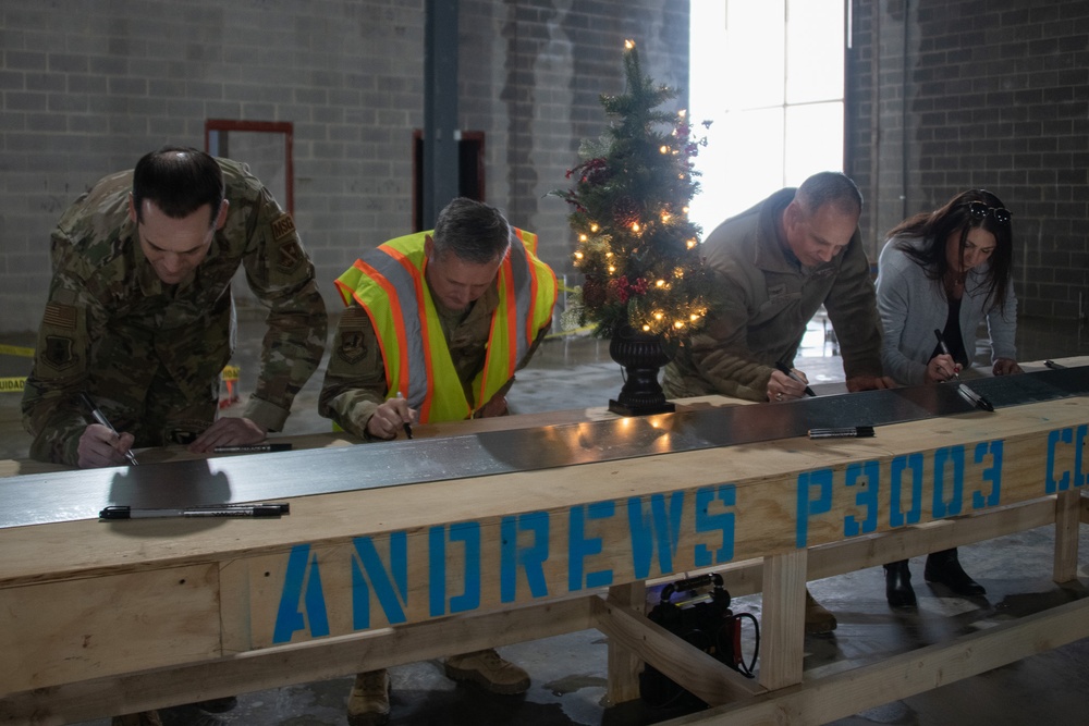 Team Andrews commemorates Consolidated Communications Center topping out ceremony