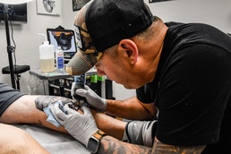 Chief connects with People as an Airman and Tattoo Artist