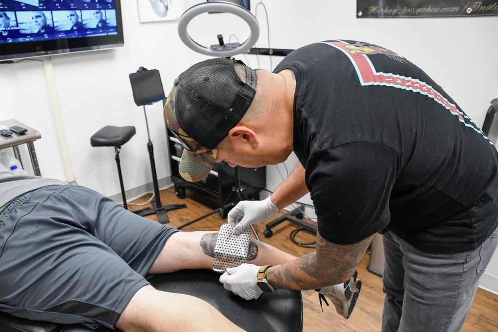 Chief connects with People as an Airman and Tattoo Artist