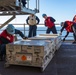 Sailors load a rolling airframe missile launcher