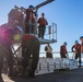 Sailors load a rolling airframe missile launcher