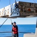 Sailors load a rolling airframe missile launcher