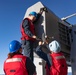 Sailors load a rolling airframe missile launcher