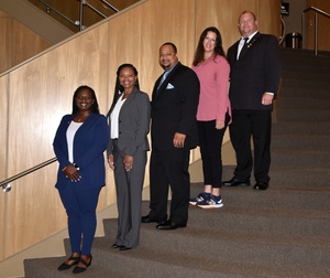 927th LRS Airmen Give Equipment To Base Hockey Team