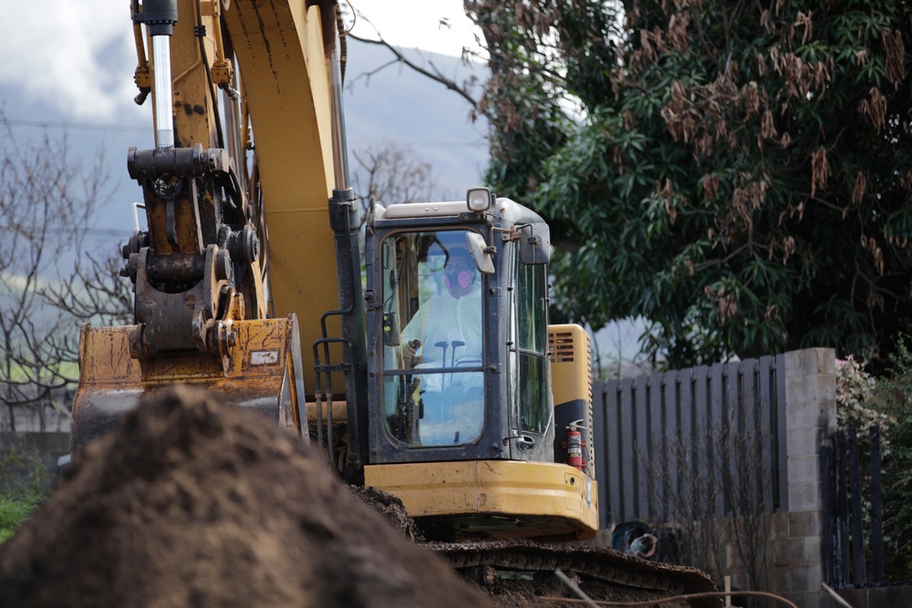 Clearing debris, keeping dust down