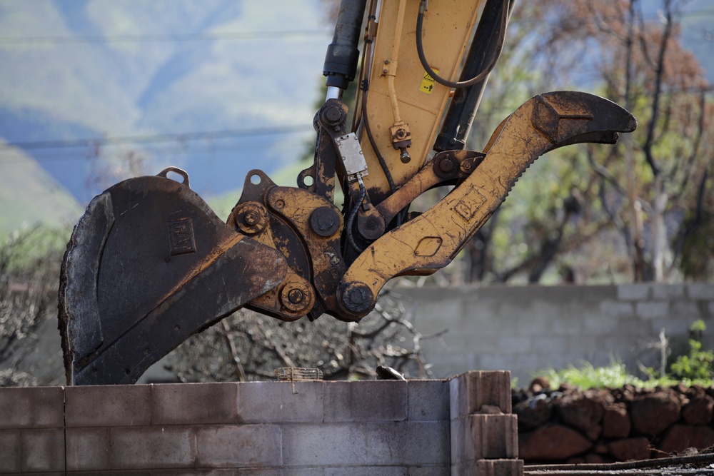 Clearing debris, keeping dust down