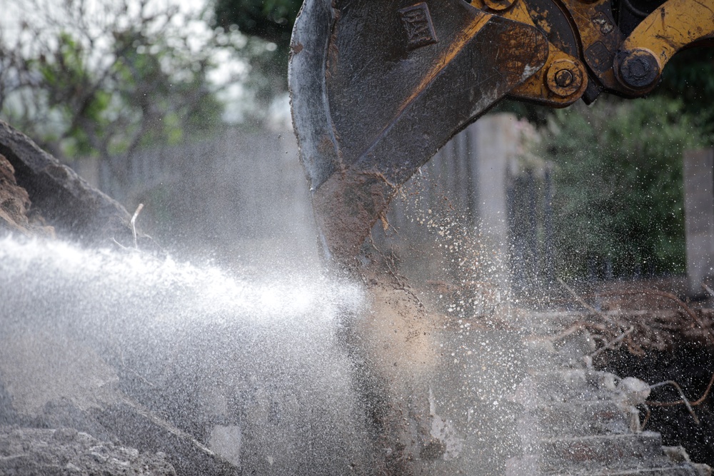 Clearing debris, keeping dust down