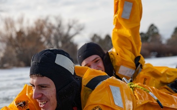 Fire fighters participate in ice rescue course