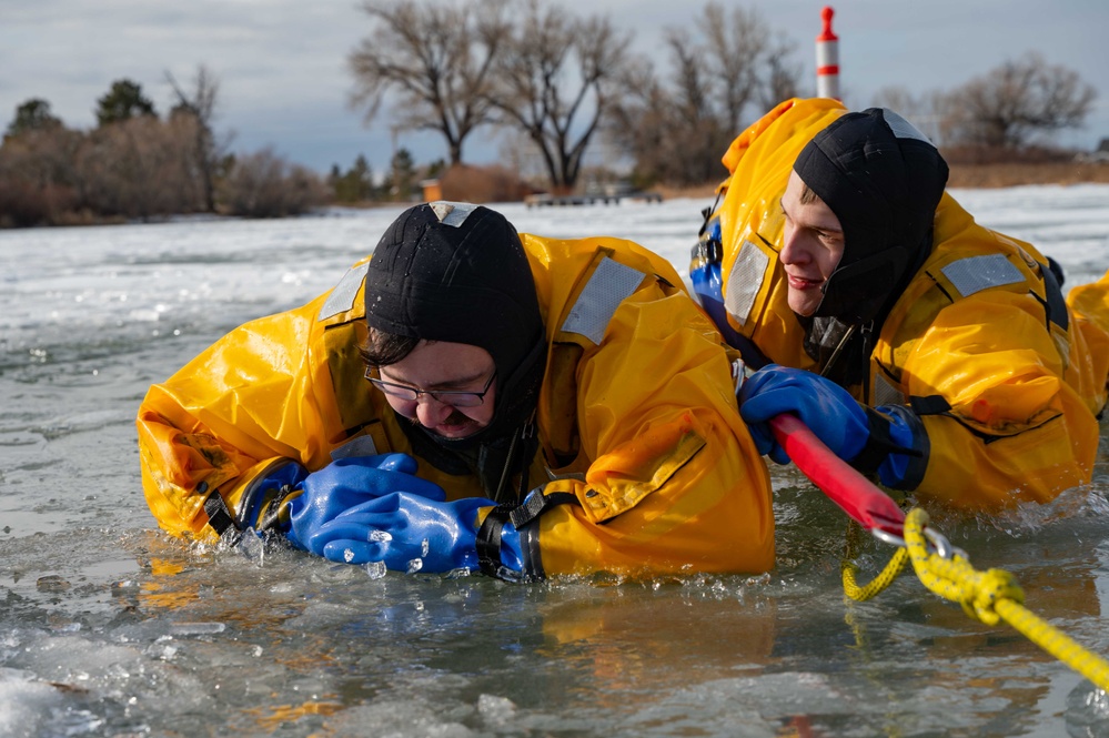 Fire fighters participate in ice rescue course