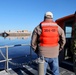 Decommissioned World War II-era fuel barge undergoing a maneuverability test to determine its towing capabilities.